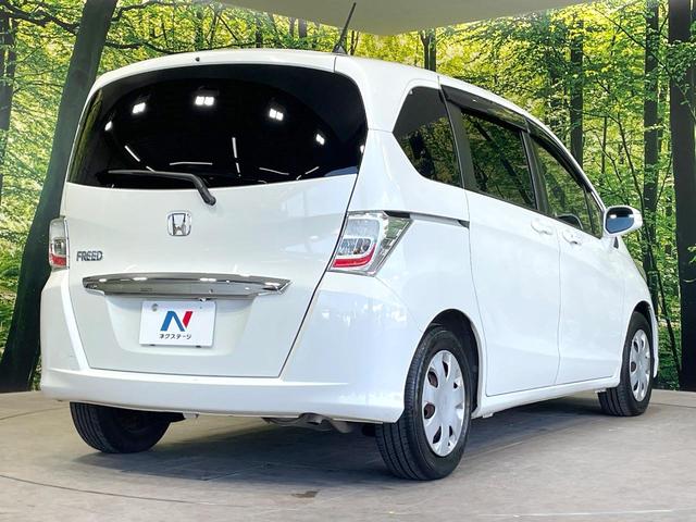 フリード G ジャストセレクション 後席モニター 電動スライドドア 禁煙車 ETC オートライト オートエアコン HIDヘッド 横滑防止装置 プライバシーガラス 盗難防止装置 キーレス(18枚目)