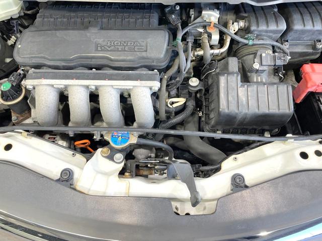 フリード G ジャストセレクション 後席モニター 電動スライドドア 禁煙車 ETC オートライト オートエアコン HIDヘッド 横滑防止装置 プライバシーガラス 盗難防止装置 キーレス(19枚目)