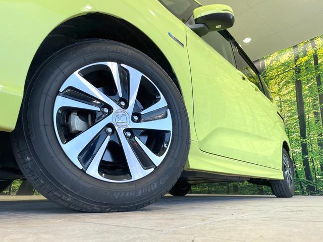 フリードハイブリッド ハイブリッド・ＥＸ　両側電動ドア　メーカーナビ　バックカメラ　衝突被害軽減システム　レーダークルーズ　禁煙車　ハーフレザーシート　ドラレコ　スマートキー　ＬＥＤヘッド　ビルトインＥＴＣ　車線逸脱警報　オートライト（14枚目）