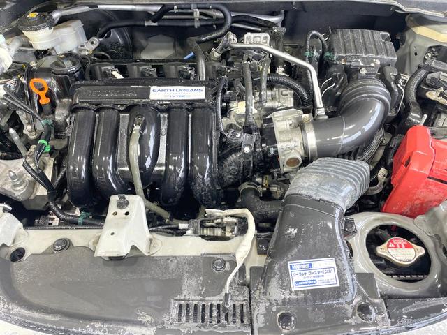 フィット １３Ｇ・Ｆ　純正ナビ　バックカメラ　禁煙車　スマートキー　ＬＥＤヘッド　ＥＴＣ　オートライト　オートエアコン　Ｂｌｕｅｔｏｏｔｈ　ＣＤ　ＤＶＤ再生　フルセグ　ＬＥＤフォグ　横滑防止装置　盗難防止装置（18枚目）