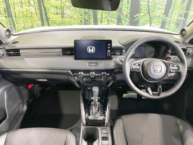 ヴェゼル e:HEV Z 登録済未使用車 純正9型ナビ 全周囲カメラ 衝突被害軽減 レーダークルーズ 電動リアゲート コーナーセンサー スマートキー LEDヘッド ETC2.0 オートハイビーム オートライト(2枚目)