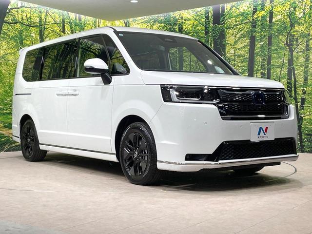 ステップワゴン e:HEVスパーダ 登録済未使用車 純正11.4型ナビ 両側電動ドア バックカメラ 衝突被害軽減 電動リアゲート レーダークルーズ シートヒーター コーナーセンサー LEDヘッド オートハイビーム 純正16インチアルミ(17枚目)