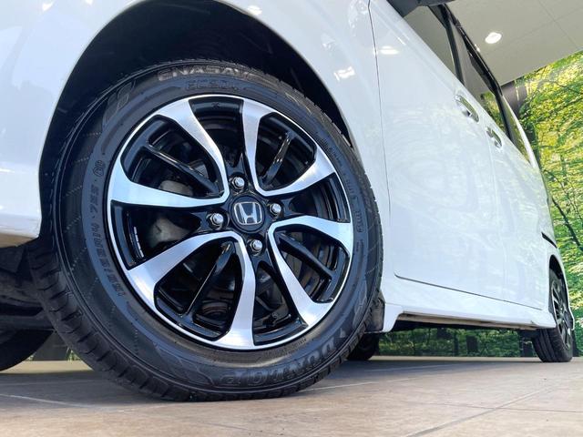 N-BOXカスタム G・EXホンダセンシング 禁煙車 ホンダセンシング 純正8型ナビ 両側電動ドア バックカメラ アダプティブクルーズ シートヒーター Bluetooth クリアランスソナー シーケンシャルターンランプ LEDヘッド(12枚目)