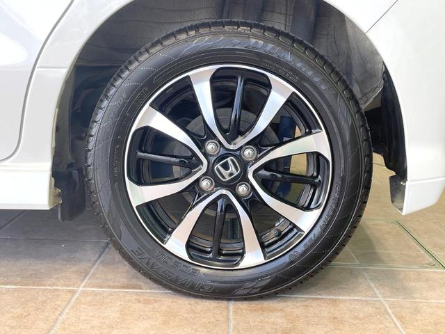 N-BOXカスタム G・EXホンダセンシング 禁煙車 ホンダセンシング 純正8型ナビ 両側電動ドア バックカメラ アダプティブクルーズ シートヒーター Bluetooth クリアランスソナー シーケンシャルターンランプ LEDヘッド(21枚目)