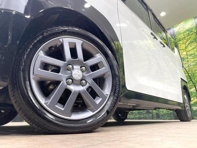 デリカミニ G プレミアム 禁煙車 e-Assist ナビ 全周囲カメラ Bluetooth シートヒーター レーダークルーズ ステアリングヒーター ロールサンシェード シートバックテーブル LEDヘッド 純正15インチアルミ(11枚目)