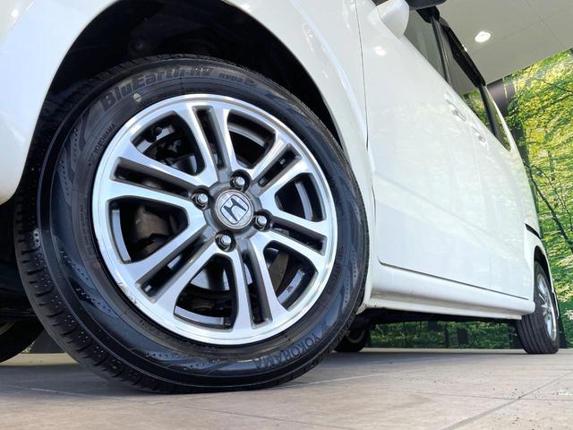 Ｎ－ＢＯＸ Ｇ　ターボＳＳパッケージ　禁煙車　シティブレーキサポート　純正ディスプレイ　バックカメラ　両側電動ドア　ＨＩＤヘッドライト　クルーズコントロール　革巻きハンドル　スマートキー　純正１４インチアルミ　オートライト（11枚目）