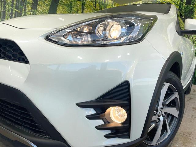 アクア クロスオーバー　純正ナビ　バックカメラ　衝突被害軽減　禁煙車　ハーフレザーシート　コーナーセンサー　ＬＥＤヘッド　純正１６インチアルミ　ＥＴＣ　オートハイビーム　オートライト　オートエアコン　Ｂｌｕｅｔｏｏｔｈ（12枚目）