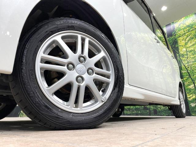 タントエグゼ カスタムX 禁煙車 ナビ スマートキー HIDヘッド 純正14インチアルミ オートエアコン CD DVD再生 プライバシーガラス 盗難防止(10枚目)