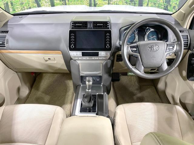 ランドクルーザープラド TX Lパッケージ マットブラックエディション 4WD 禁煙車 サンルーフ メーカー9型ナビ 全周囲カメラ シートベンチレーション ベージュ革シート 7人乗 ルーフレール LEDヘッド オートマチックハイビーム ETC(2枚目)