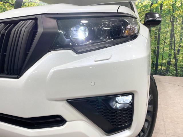 ランドクルーザープラド TX Lパッケージ マットブラックエディション 4WD 禁煙車 サンルーフ メーカー9型ナビ 全周囲カメラ シートベンチレーション ベージュ革シート 7人乗 ルーフレール LEDヘッド オートマチックハイビーム ETC(13枚目)