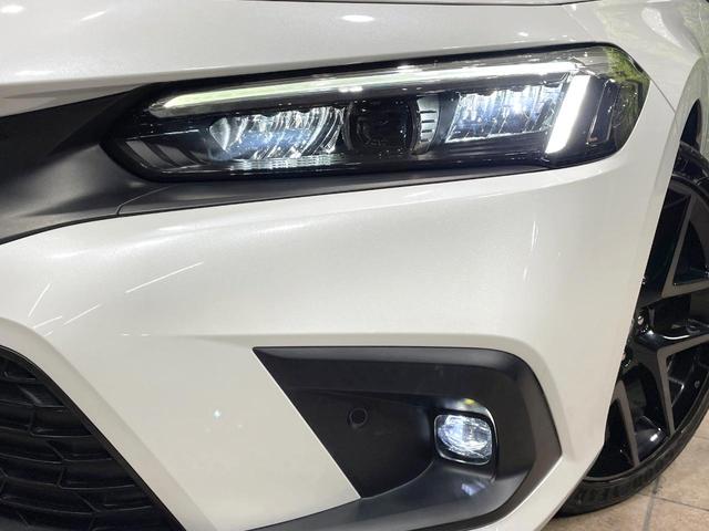 シビック ＥＸ　純正９型ナビ　バックカメラ　ＢＯＳＥサウンド　衝突軽減　ハーフレザーシート　シートヒーター　ドラレコ　コーナーセンサー　スマートキー　ＬＥＤヘッド　ビルトインＥＴＣ　純正１８インチＡＷ（12枚目）