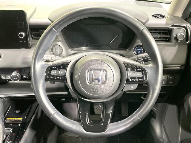 ヴェゼル ｅ：ＨＥＶ　Ｚ　禁煙車　ホンダセンシング　純正９型ナビ　バックカメラ　電動リアゲート　シートヒーター　ハーフレザーシート　アダプティブクルーズ　ＬＥＤヘッド　シーケンシャルターンランプ　ＥＴＣ（11枚目）