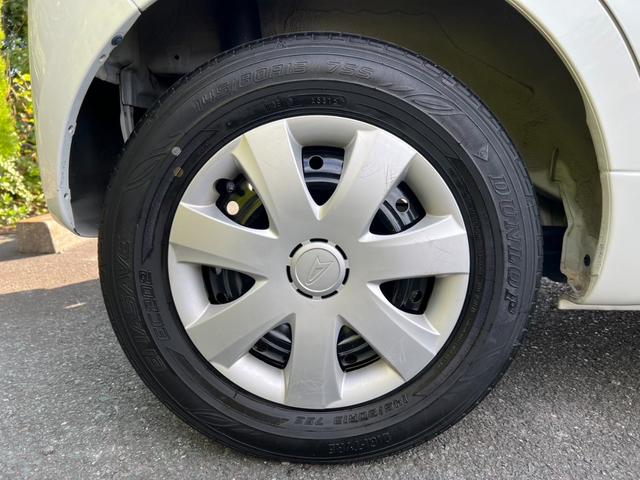 ムーヴ Ｌ　Ｔチェーン　キーレス　５ＭＴ　ＥＴＣ　エアコン　ＣＤ　ＦＭ／ＡＭ　Ｗエアバッグ　取説記録簿（27枚目）