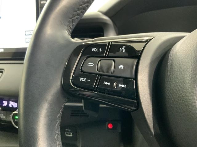 ヴェゼル ｅ：ＨＥＶＺ　Ｈ　ＳＥＮＳＩＮＧ　最長５年保証　ワンオーナー　ナビＶＸＵ－２１５ＶＺｉ　ＴＶ　Ｒカメラ　ＣＤ録音　ＢＴオ－ディオ　ＤＶＤ　ドラレコ　ＥＴＣ　ＬＥＤライト　横滑り防止　シ－トヒ－タ－　クルコン　アルミ（9枚目）