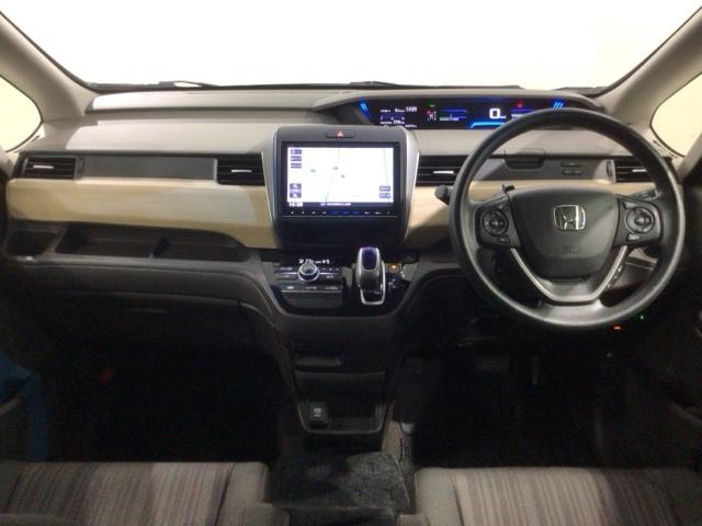 フリードハイブリッド ハイブリッド・Ｇホンダセンシング　１年保証　ナビＶＸＭ－１７５ＶＦＮｉ　ＴＶ　Ｒカメラ　ＣＤ録音　ＢＴオ－ディオ　ＤＶＤ　ドラレコ　ＥＴＣ　ＬＥＤライト　両側電動ドア　ＶＳＡ　クルコン　スマ－トキ－　盗難防止装置　整備記録簿　ＡＡＣ（9枚目）