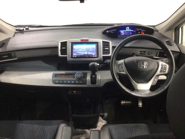 フリードハイブリッド ジャストセレクション　１年保証　ナビ　ＴＶ　Ｒカメラ　ＣＤ録音　ＢＴオ－ディオ　ＤＶＤ　ドラレコ　ＥＴＣ　ＨＩＤ　両側電動ドア　ＶＳＡ　クルコン　アルミ　スマ－トキ－　盗難防止装置　整備記録簿　ＡＡＣ　スペアキ－　地デジ（7枚目）