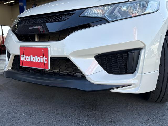 フィット １３Ｇ・Ｆパッケージ　無限エアロ　ＨＫＳマフラー　無限Ｒスポイラー　無限グリル　外１７ＡＷ　純正ナビ　フルセグ　Ｂカメラ　ＥＴＣ　無限サイドバイザー　無限フロアマット　外レーダー　ドラレコ　外ＬＥＤヘッド　スマートキーＸ２（32枚目）