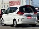 フリード G・ホンダセンシング 純正ナビ フルセグ BT対応 ホンダセンシング センターテーブル 両側パワスラ シートヒーター クルコン ドラレコ ETC スマートキー 保証書 取説 記録簿(5枚目)