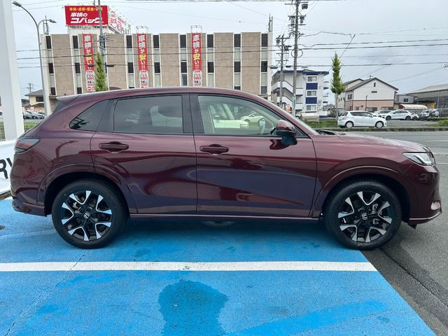 ZR-V e:HEVZ 当社デモカー、ナビ、マルチビューカメラ、禁煙車、ドラレコ3カメラ、etc、保証1年付き AW Pセンサー レザー Bカメラ サイドエアバック パワ-シ-ト ナビTV LEDヘッドライト USB接続(9枚目)