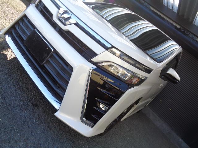 ヴォクシー ＺＳ　４ＷＤ　７人乗り　禁煙車　純正９インチナビ／ＴＶ／ＤＶＤ／ＣＤ／Ｂｌｕｅｔｏｏｔｈ　フリップダウンモニター　バックカメラ　ＥＴＣ　両側パワースライドドア　純正１６アルミ　スマートキー２本（14枚目）