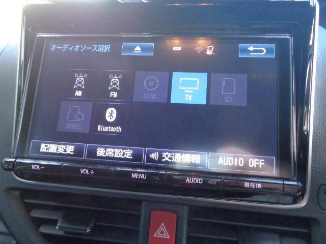 ヴォクシー ＺＳ　４ＷＤ　７人乗り　禁煙車　純正９インチナビ／ＴＶ／ＤＶＤ／ＣＤ／Ｂｌｕｅｔｏｏｔｈ　フリップダウンモニター　バックカメラ　ＥＴＣ　両側パワースライドドア　純正１６アルミ　スマートキー２本（35枚目）