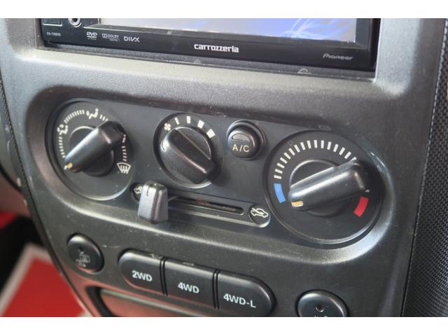 ジムニー クロスアドベンチャーＸＣ　キーレス　ハーフレザーシート　シートヒーター　ＥＴＣ　ＨＩＤヘッドライト　社外ディススプレイオーディオ　社外フロント　リアバンパー　社外テール　社外マフラー　２インチリフトアップ（10枚目）