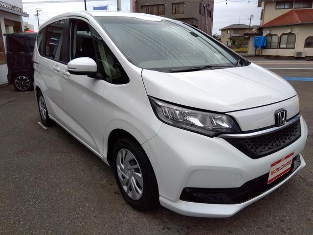 フリード Ｇ☆８型ナビ☆後席Ｍ☆禁煙車☆６人乗☆走行２．４万☆試乗ＯＫ　８型ナビ☆☆Ｂｌｕｅｔｏｏｔｈ☆バックカメラ☆ＥＴＣ☆フリップダウンモニター☆シートヒーター☆ミラー＆ワイパーヒーター☆ホンダセンシング☆レーダークルーズ操舵支援☆両側電動ドア☆走行２．４万☆試乗ＯＫ（4枚目）