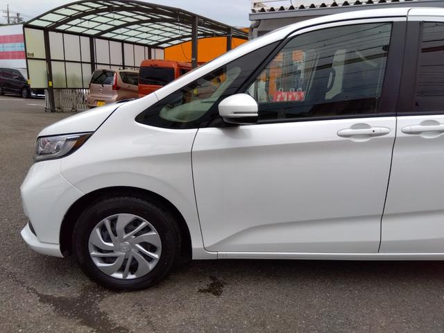 フリード Ｇ☆８型ナビ☆後席Ｍ☆禁煙車☆６人乗☆走行２．４万☆試乗ＯＫ　８型ナビ☆☆Ｂｌｕｅｔｏｏｔｈ☆バックカメラ☆ＥＴＣ☆フリップダウンモニター☆シートヒーター☆ミラー＆ワイパーヒーター☆ホンダセンシング☆レーダークルーズ操舵支援☆両側電動ドア☆走行２．４万☆試乗ＯＫ（6枚目）