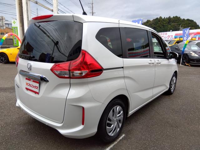 フリード Ｇ☆８型ナビ☆後席Ｍ☆禁煙車☆６人乗☆走行２．４万☆試乗ＯＫ　８型ナビ☆☆Ｂｌｕｅｔｏｏｔｈ☆バックカメラ☆ＥＴＣ☆フリップダウンモニター☆シートヒーター☆ミラー＆ワイパーヒーター☆ホンダセンシング☆レーダークルーズ操舵支援☆両側電動ドア☆走行２．４万☆試乗ＯＫ（10枚目）