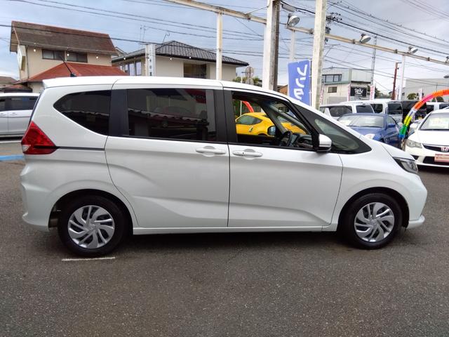 フリード Ｇ☆８型ナビ☆後席Ｍ☆禁煙車☆６人乗☆走行２．４万☆試乗ＯＫ　８型ナビ☆☆Ｂｌｕｅｔｏｏｔｈ☆バックカメラ☆ＥＴＣ☆フリップダウンモニター☆シートヒーター☆ミラー＆ワイパーヒーター☆ホンダセンシング☆レーダークルーズ操舵支援☆両側電動ドア☆走行２．４万☆試乗ＯＫ（11枚目）