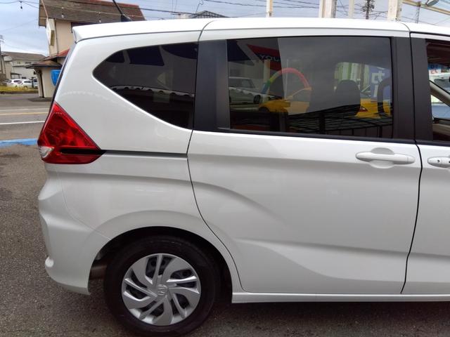 フリード Ｇ☆８型ナビ☆後席Ｍ☆禁煙車☆６人乗☆走行２．４万☆試乗ＯＫ　８型ナビ☆☆Ｂｌｕｅｔｏｏｔｈ☆バックカメラ☆ＥＴＣ☆フリップダウンモニター☆シートヒーター☆ミラー＆ワイパーヒーター☆ホンダセンシング☆レーダークルーズ操舵支援☆両側電動ドア☆走行２．４万☆試乗ＯＫ（13枚目）