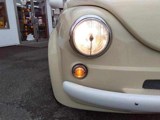 マーチ Good Wood Park製バービー仕様☆修復無☆禁煙車☆ Good Wood Park製ハービー仕様☆専用ホイールキャップ☆メモリナビ☆DVD再生☆Bluetooth☆ETC☆オートリトラミラー☆オートライト☆キーレス☆車検9年4月迄☆走行5.4万☆試乗OK(14枚目)