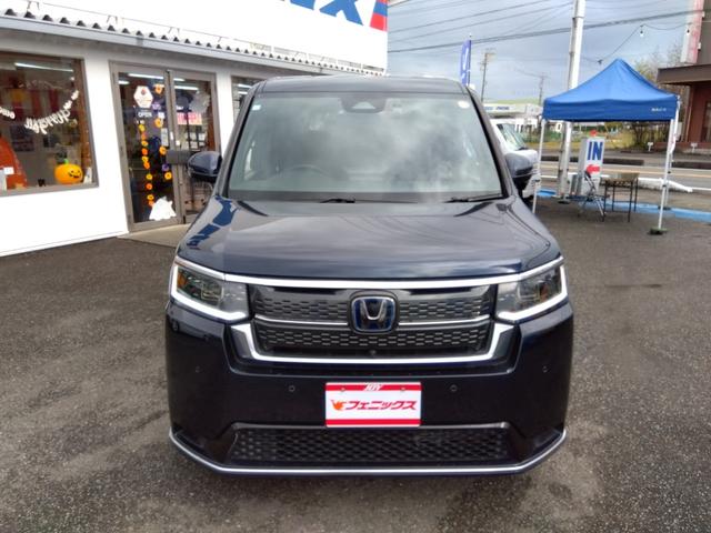 ステップワゴン ｅ：ＨＥＶスパーダ☆プレミアム☆１１型ナビ☆後席１０型モニタ　純正１１型ナビ・スマフォ連携Ａｐｐｌｅ＆Ａｎｄｒｏｉｄ・ホンダトータルケア対応・後席１０型フリップ・ナビ連動前後ドラレコ＆ＥＴＣ・全方位カメラ・ハーフレザー前後ヒーター・コーナーソナー・運転支援（3枚目）