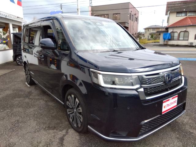 ステップワゴン ｅ：ＨＥＶスパーダ☆プレミアム☆１１型ナビ☆後席１０型モニタ　純正１１型ナビ・スマフォ連携Ａｐｐｌｅ＆Ａｎｄｒｏｉｄ・ホンダトータルケア対応・後席１０型フリップ・ナビ連動前後ドラレコ＆ＥＴＣ・全方位カメラ・ハーフレザー前後ヒーター・コーナーソナー・運転支援（4枚目）