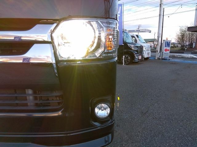 ハイエースバン スーパーＧＬダークプライム☆ディーゼル☆後席Ｍ☆ベッドキッド　ディーゼル☆１オーナー☆ベッドキッド☆革調シート☆テーブル＆ウッドパネル☆ＬＥＤテール☆シーケンシャルウィンカ☆Ｈｅａｒｔｓホイール☆ホワイトレター☆ルーフキャリア☆フロントリップ☆ナビ☆後席モニター（12枚目）