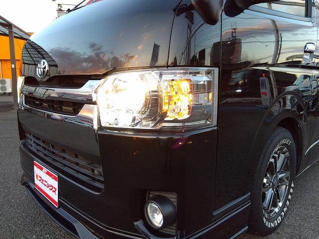 ハイエースバン スーパーＧＬダークプライム☆ディーゼル☆後席Ｍ☆ベッドキッド　ディーゼル☆１オーナー☆ベッドキッド☆革調シート☆テーブル＆ウッドパネル☆ＬＥＤテール☆シーケンシャルウィンカ☆Ｈｅａｒｔｓホイール☆ホワイトレター☆ルーフキャリア☆フロントリップ☆ナビ☆後席モニター（13枚目）