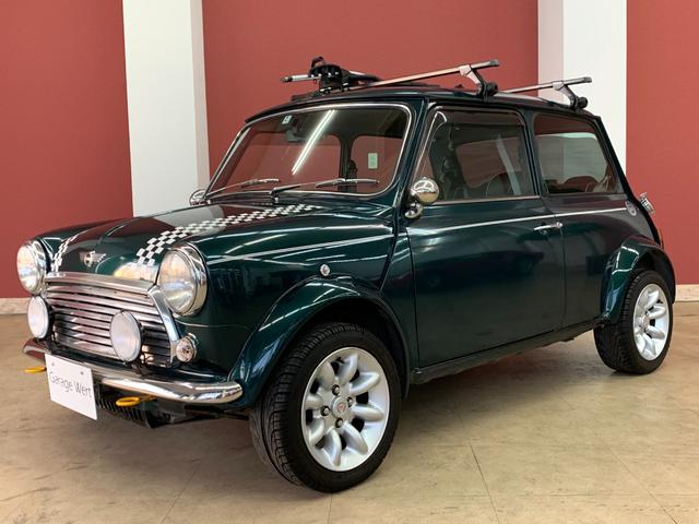 ＭＩＮＩ クーパー　スポーツパックリミテッド　６００台限定モデル・黒革シート・ウッドパネル・オーバーフェンダー・センターマフラー・サイクルキャリア・純正１３インチアルミ・ＨＩＤライト・社外オートライト（7枚目）