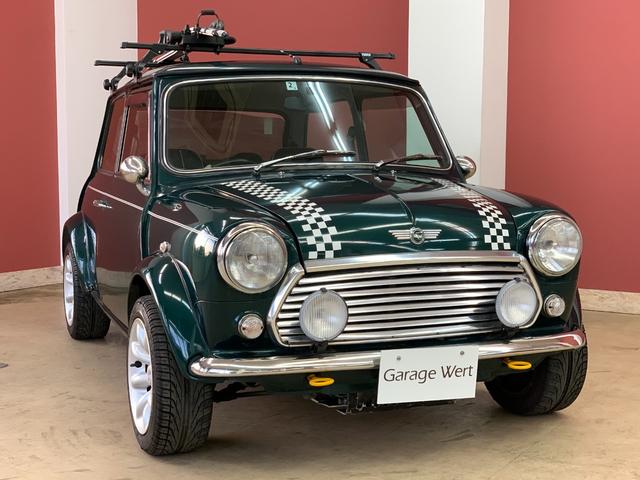 ＭＩＮＩ クーパー　スポーツパックリミテッド　６００台限定モデル・黒革シート・ウッドパネル・オーバーフェンダー・センターマフラー・サイクルキャリア・純正１３インチアルミ・ＨＩＤライト・社外オートライト（8枚目）