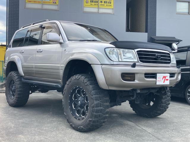 ランドクルーザー１００ ＶＸリミテッド　Ｇセレクション　１ナンバー登録　走行５．５万キロ　４ＷＤ　リフトアップ　アクティブコントローラー　サンルーフ　本革　パワーシート　社外マフラー　テール　オーバーフェンダー　アルミホイール（3枚目）