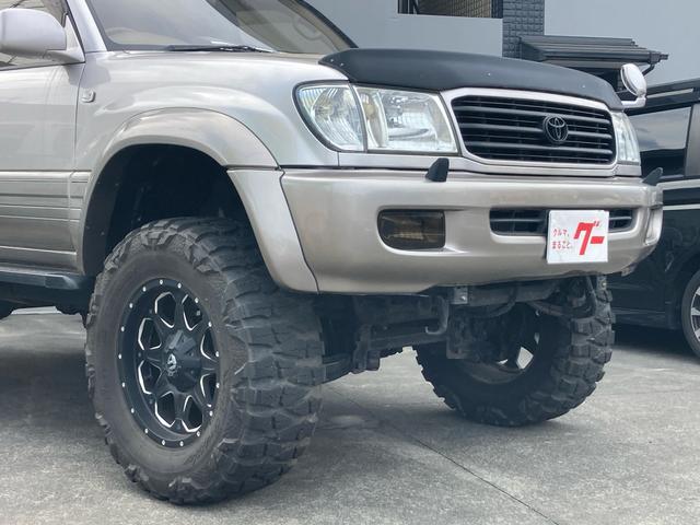 ランドクルーザー１００ ＶＸリミテッド　Ｇセレクション　１ナンバー登録　走行５．５万キロ　４ＷＤ　リフトアップ　アクティブコントローラー　サンルーフ　本革　パワーシート　社外マフラー　テール　オーバーフェンダー　アルミホイール（6枚目）