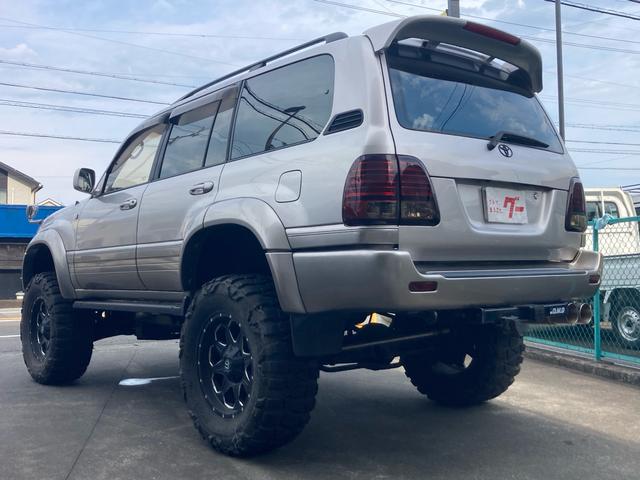 ランドクルーザー１００ ＶＸリミテッド　Ｇセレクション　１ナンバー登録　走行５．５万キロ　４ＷＤ　リフトアップ　アクティブコントローラー　サンルーフ　本革　パワーシート　社外マフラー　テール　オーバーフェンダー　アルミホイール（14枚目）