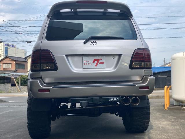 ランドクルーザー１００ ＶＸリミテッド　Ｇセレクション　１ナンバー登録　走行５．５万キロ　４ＷＤ　リフトアップ　アクティブコントローラー　サンルーフ　本革　パワーシート　社外マフラー　テール　オーバーフェンダー　アルミホイール（15枚目）