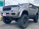 ランドクルーザー１００ ＶＸリミテッド　Ｇセレクション　１ナンバー登録　走行５．５万キロ　４ＷＤ　リフトアップ　アクティブコントローラー　サンルーフ　本革　パワーシート　社外マフラー　テール　オーバーフェンダー　アルミホイール（5枚目）