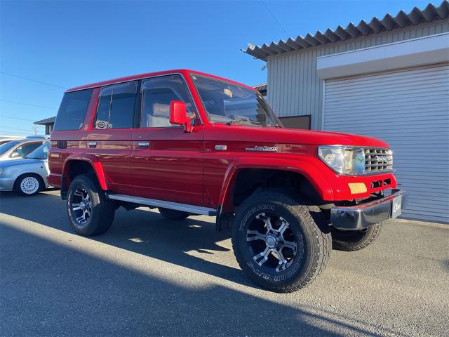 ランドクルーザープラド EXワイド EXワイド 2.4Lディーゼルターボ 5人乗り 1ナンバー登録車輛 サンルーフ リフトアップ 16インチアルミ 265/75R16ジオランダーAT-S ナビ フルセグTV ETC A/C修理済(4枚目)