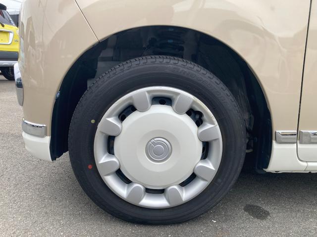 ムーヴキャンバス Ｘメイクアップリミテッド　ＳＡＩＩＩ　１４インチフルホイールキャップ　キーフリーシステム　両側パワースライドドア　オートエアコン（プッシュ式）　オートライト　置きラクボックス（19枚目）
