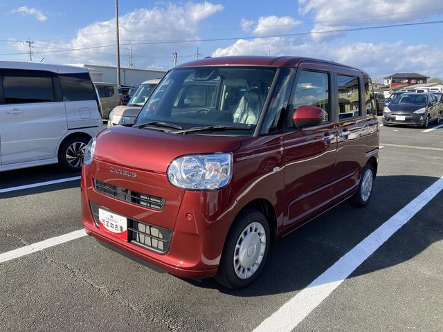 ムーヴキャンバス セオリーＸ　ナビ付　ナビ　１４インチフルホイールキャップ　キーフリーシステム　プッシュボタンスタート　ＵＶカットガラス　両側パワースライドドア　ハロゲンヘッドライト　ラゲージアンダーボックス（6枚目）