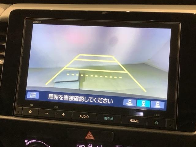 フィット ｅ：ＨＥＶＲＳ　Ｈ　ＳＥＮＳＩＮＧ　新車保証　試乗車　ワンオ－ナ－　ナビＶＸＭ－２４５ＺＦＥｉ　ＴＶ　Ｒカメラ　ＢＴオ－ディオ　ＥＴＣ　ＬＥＤライト　ＶＳＡ　クルコン　アルミ　スマ－トキ－　スペアキ－　盗難防止装置（7枚目）