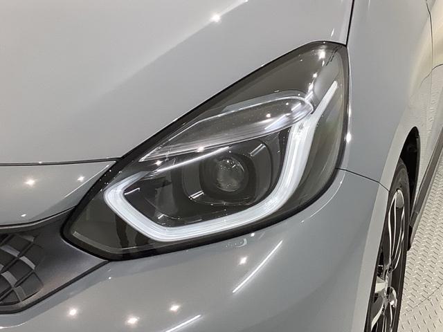 フィット ｅ：ＨＥＶＲＳ　Ｈ　ＳＥＮＳＩＮＧ　新車保証　試乗車　ワンオ－ナ－　ナビＶＸＭ－２４５ＺＦＥｉ　ＴＶ　Ｒカメラ　ＢＴオ－ディオ　ＥＴＣ　ＬＥＤライト　ＶＳＡ　クルコン　アルミ　スマ－トキ－　スペアキ－　盗難防止装置（8枚目）