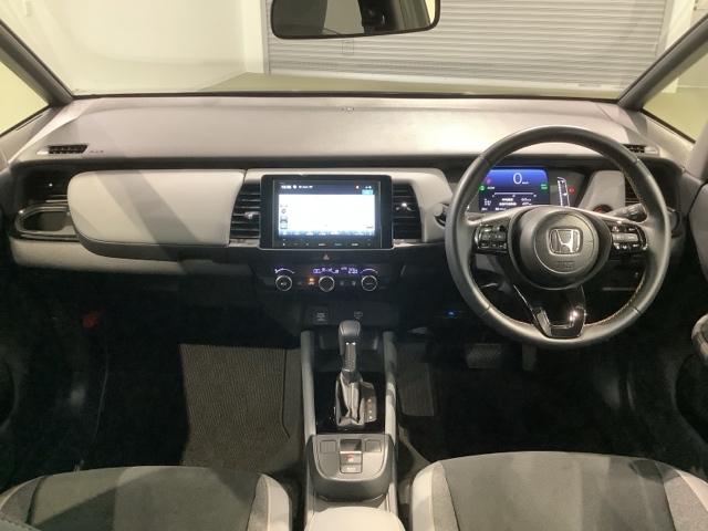 フィット ｅ：ＨＥＶＲＳ　Ｈ　ＳＥＮＳＩＮＧ　新車保証　試乗車　ワンオ－ナ－　ナビＶＸＭ－２４５ＺＦＥｉ　ＴＶ　Ｒカメラ　ＢＴオ－ディオ　ＥＴＣ　ＬＥＤライト　ＶＳＡ　クルコン　アルミ　スマ－トキ－　スペアキ－　盗難防止装置（9枚目）