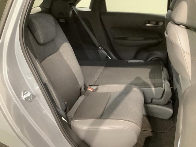 フィット ｅ：ＨＥＶＲＳ　Ｈ　ＳＥＮＳＩＮＧ　新車保証　試乗車　ワンオ－ナ－　ナビＶＸＭ－２４５ＺＦＥｉ　ＴＶ　Ｒカメラ　ＢＴオ－ディオ　ＥＴＣ　ＬＥＤライト　ＶＳＡ　クルコン　アルミ　スマ－トキ－　スペアキ－　盗難防止装置（33枚目）